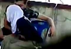 Redhead video sex erotici avvitamento una donna sulla sedia.